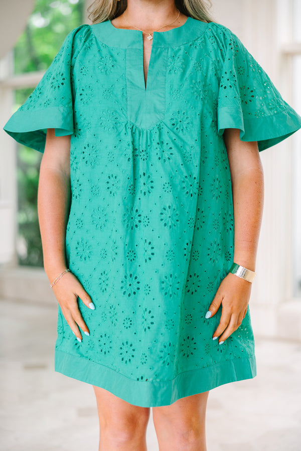 Chic Soul plus size clothing, turquoise knee length dress with bell sleeves a slight v-neckline as well as a circle eyelet pattern throughout 