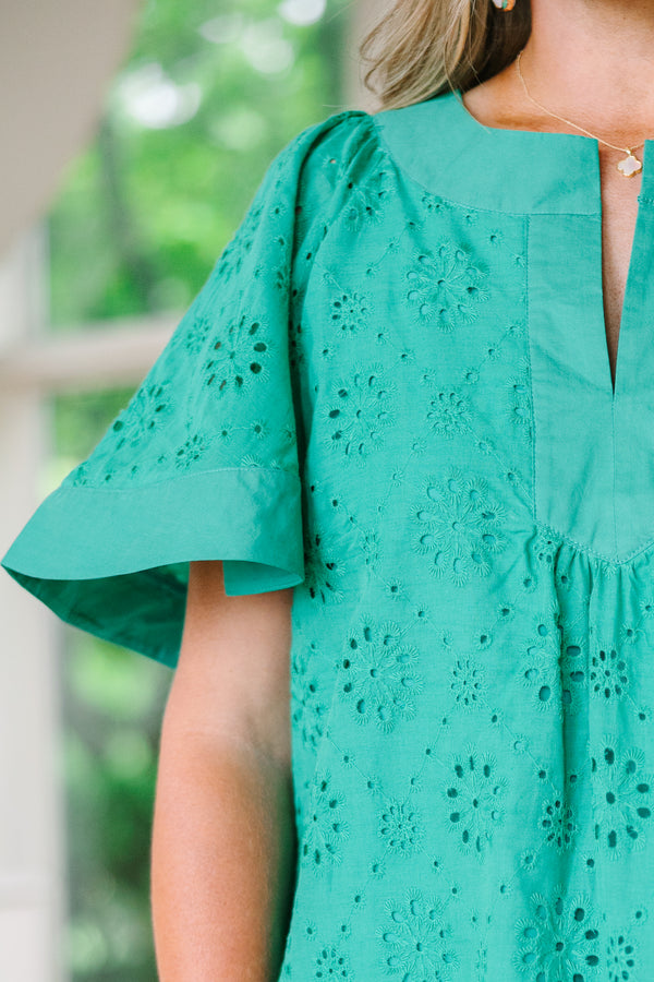 Chic Soul plus size clothing, turquoise knee length dress with bell sleeves a slight v-neckline as well as a circle eyelet pattern throughout 
