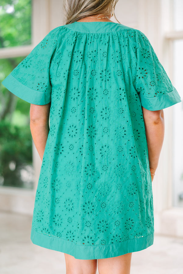 Chic Soul plus size clothing, turquoise knee length dress with bell sleeves a slight v-neckline as well as a circle eyelet pattern throughout 