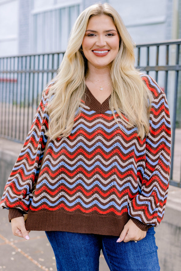 Chic Soul plus size clothing, brown-multi long sleeve sweater with a brown red and blue wavy pattern  and a slight v-neckline