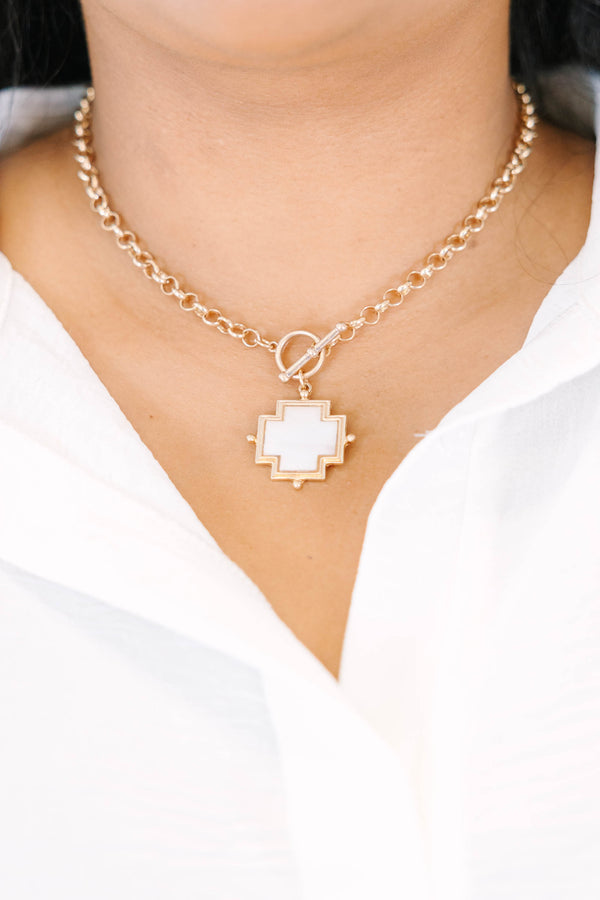 Plus Size gold toggle chain necklace with a white mother of pearl cross pendant.
