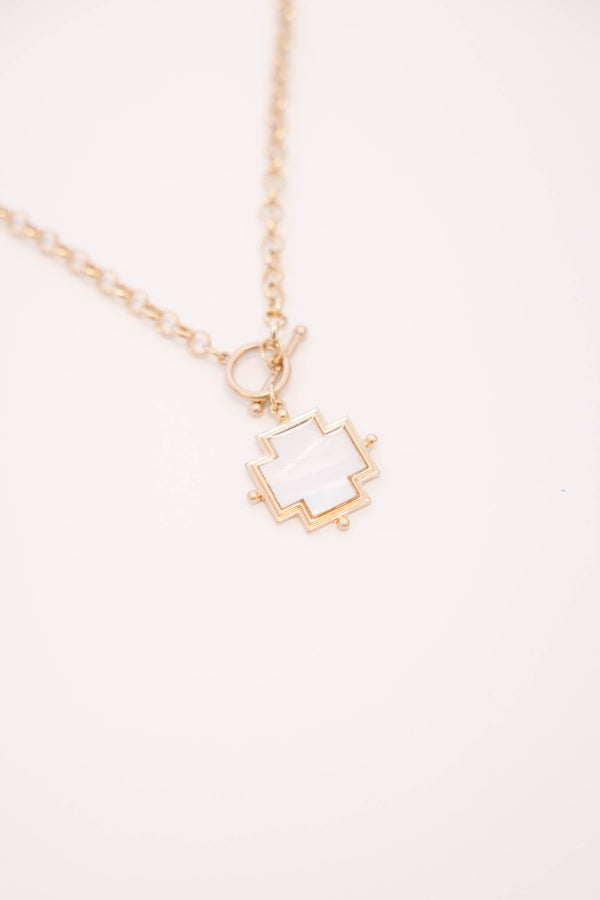 Plus Size gold toggle chain necklace with a white mother of pearl cross pendant.
