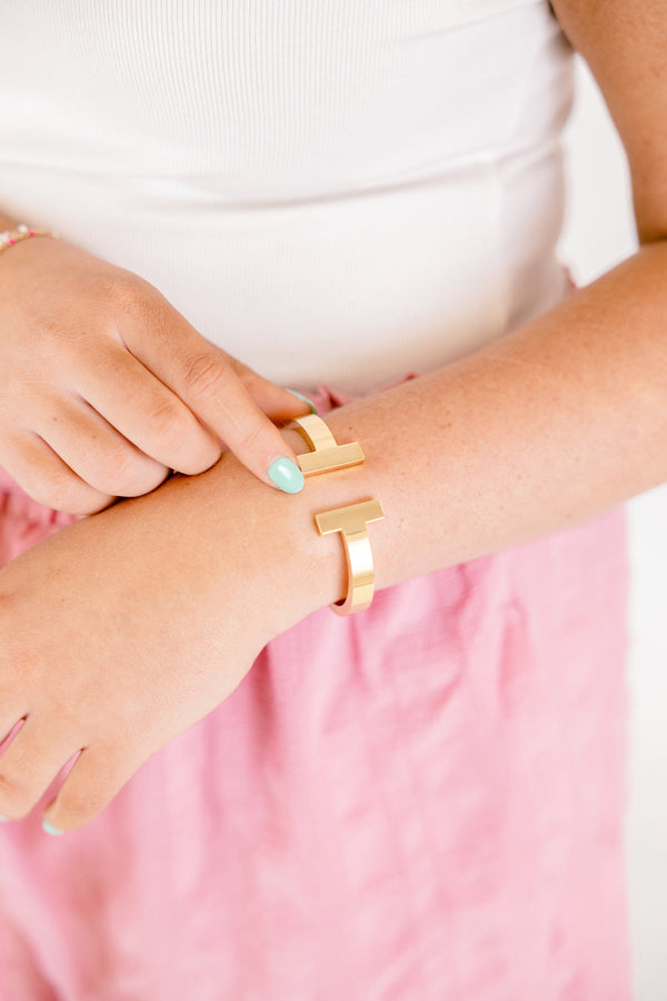 Chic Soul plus size clothing, gold open cuff bracelet with a horizontal gold bar on each side of the wrist 