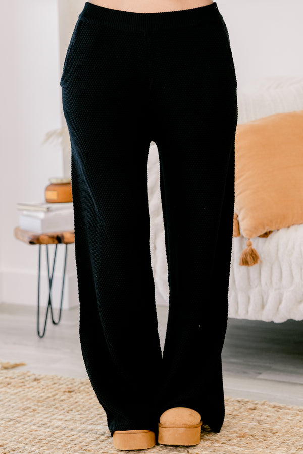 Chic Soul Plus size Clothing, black set with pants and a long sleeve top that have a waffle knit texture and the the top has buttons going down to the chest 