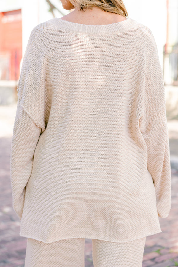 Chic Soul Plus size Clothing, cream set with pants and a long sleeve top that have a waffle knit texture and the the top has buttons going down to the chest 