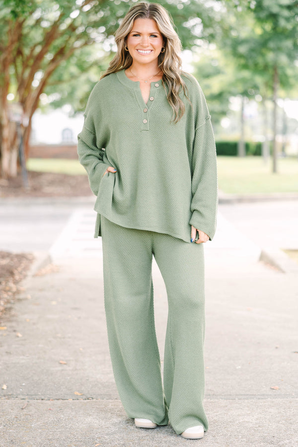 Plus size olive green knit set with a button-down henley top and matching shorts in a relaxed fit.