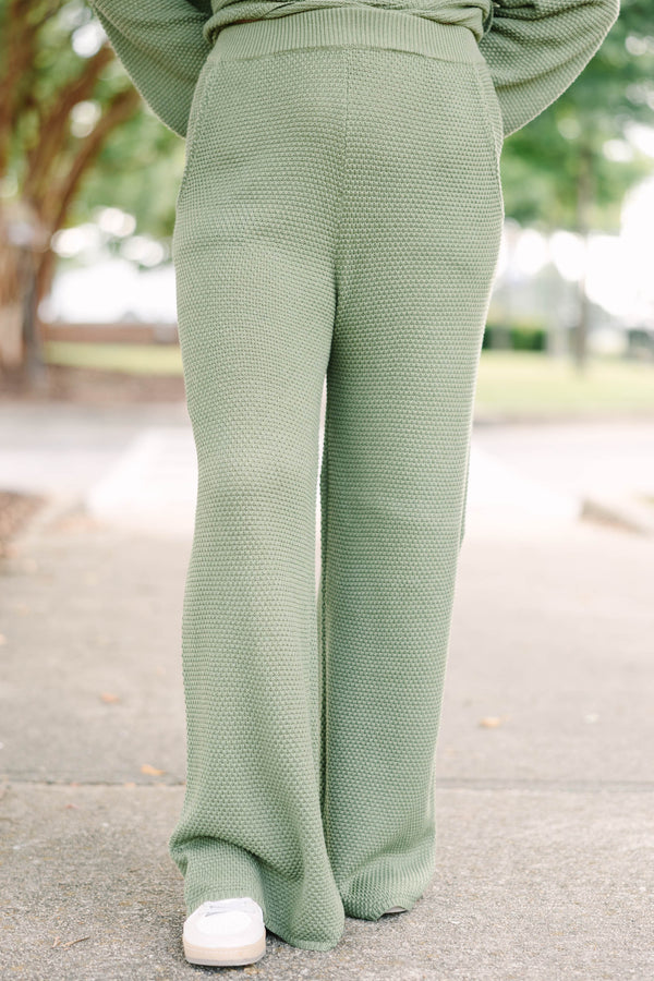 Plus size olive green knit set with a button-down henley top and matching shorts in a relaxed fit.