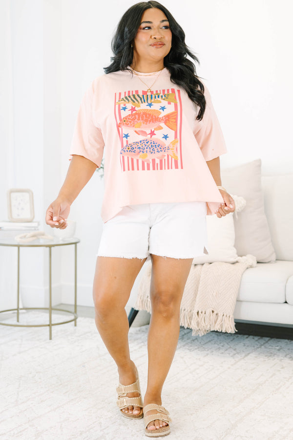 Plus Size blush pink vintage wash tee with a colorful graphic of three fish and red stripes.