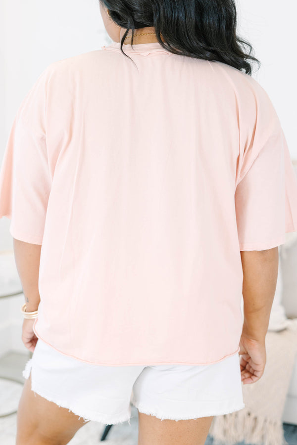 Plus Size blush pink vintage wash tee with a colorful graphic of three fish and red stripes.