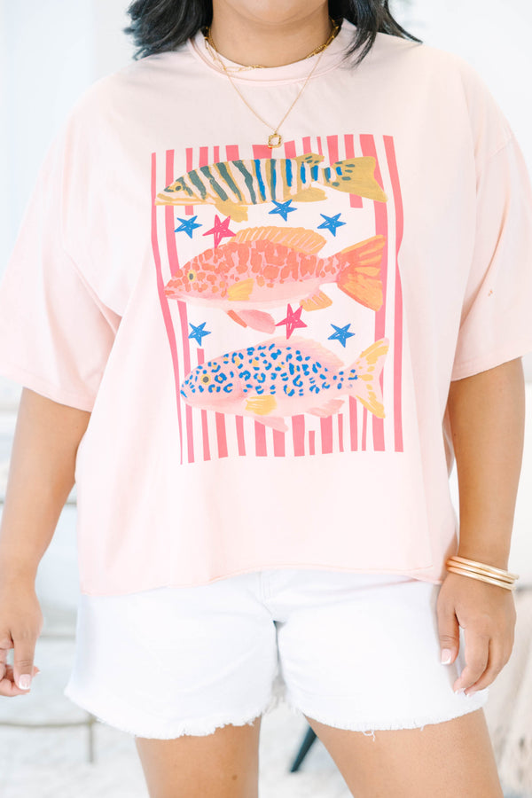 Plus Size blush pink vintage wash tee with a colorful graphic of three fish and red stripes.
