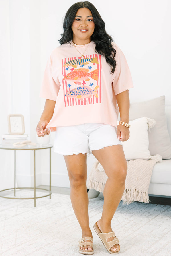 Plus Size blush pink vintage wash tee with a colorful graphic of three fish and red stripes.