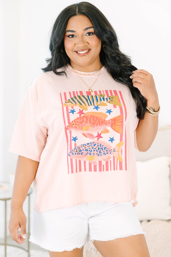 Plus Size blush pink vintage wash tee with a colorful graphic of three fish and red stripes.