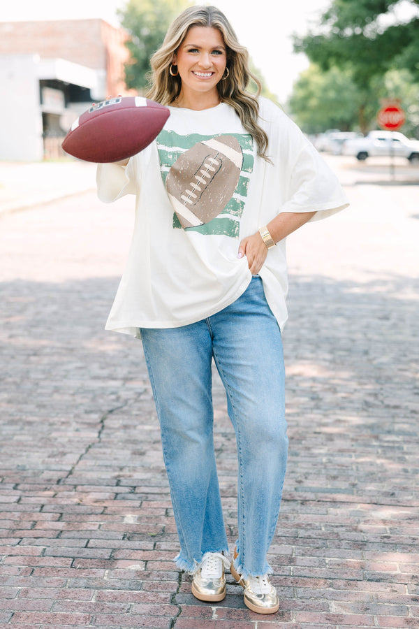 Plus Size ivory oversized boyfriend tee with a football graphic 