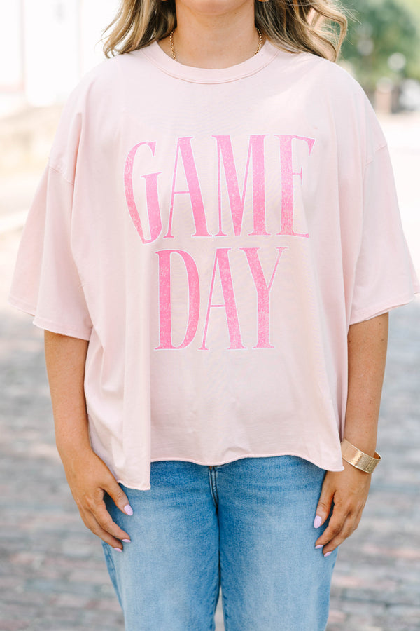 Plus Size vintage wash blush pink t-shirt with pink GAME DAY text, crew neck, and unfinished hem.