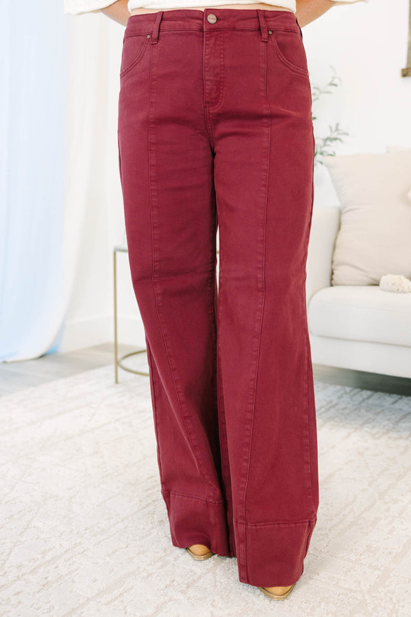 Plus size wine-colored wide leg pants in a stretchy cotton blend with a flattering high-waist fit.