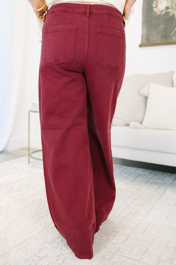 Plus size wine-colored wide leg pants in a stretchy cotton blend with a flattering high-waist fit.