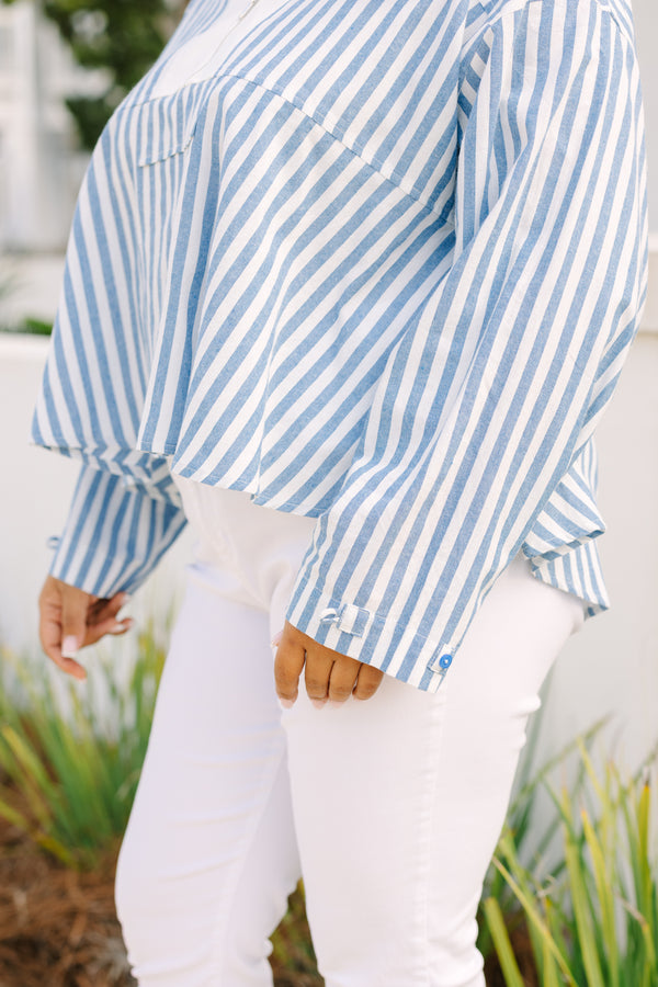 Chic Soul plus size clothing, blue striped top with a zipper detail on the chest outlined by solid white blocking around the neckline and the zipper.
