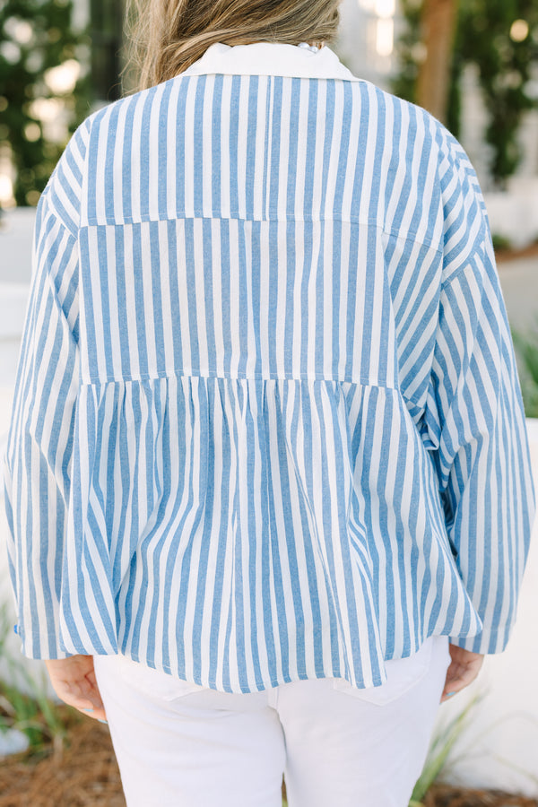 Chic Soul plus size clothing, blue striped top with a zipper detail on the chest outlined by solid white blocking around the neckline and the zipper.
