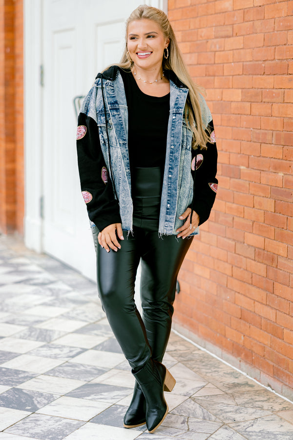 Chic Soul plus size clothing, denim jacket with long black sleeves that have sparkly football patches along each sleeve 
