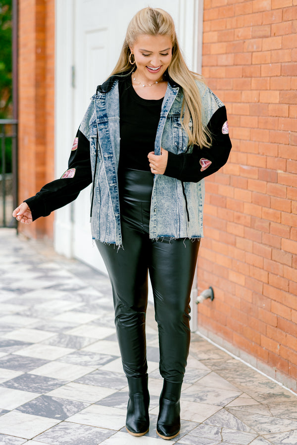 Chic Soul plus size clothing, denim jacket with long black sleeves that have sparkly football patches along each sleeve 