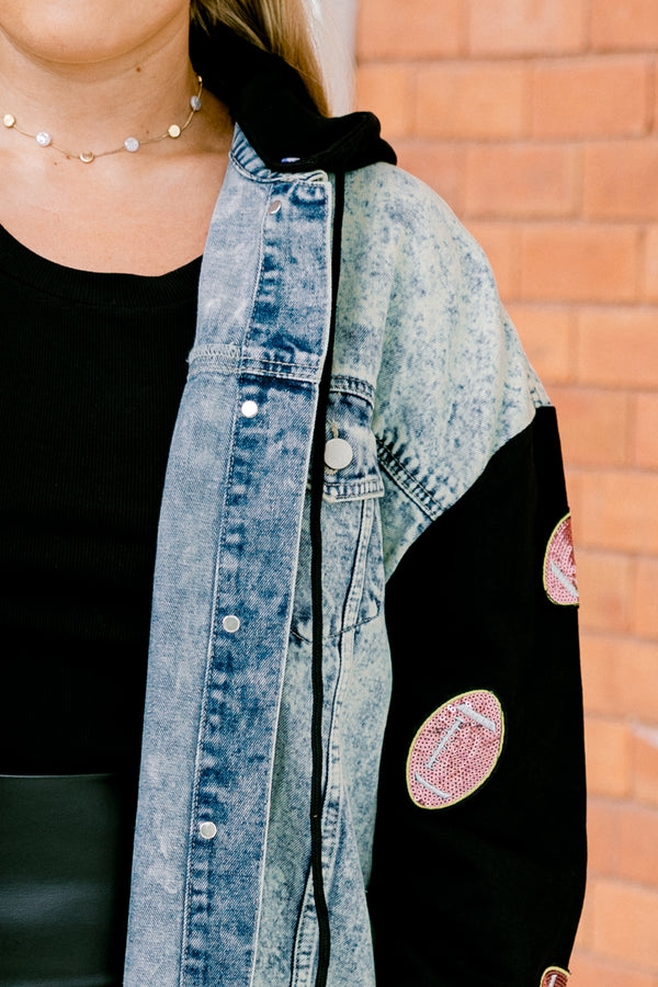 Chic Soul plus size clothing, denim jacket with long black sleeves that have sparkly football patches along each sleeve 