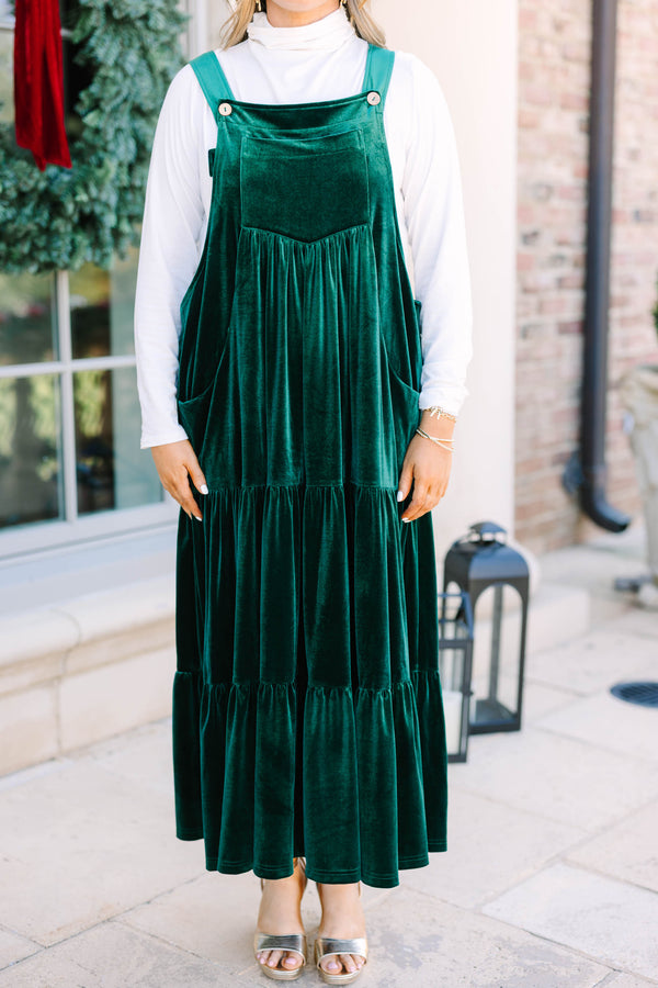 Plus size hunter green velvet tiered overall dress with a flowy fit and pockets.