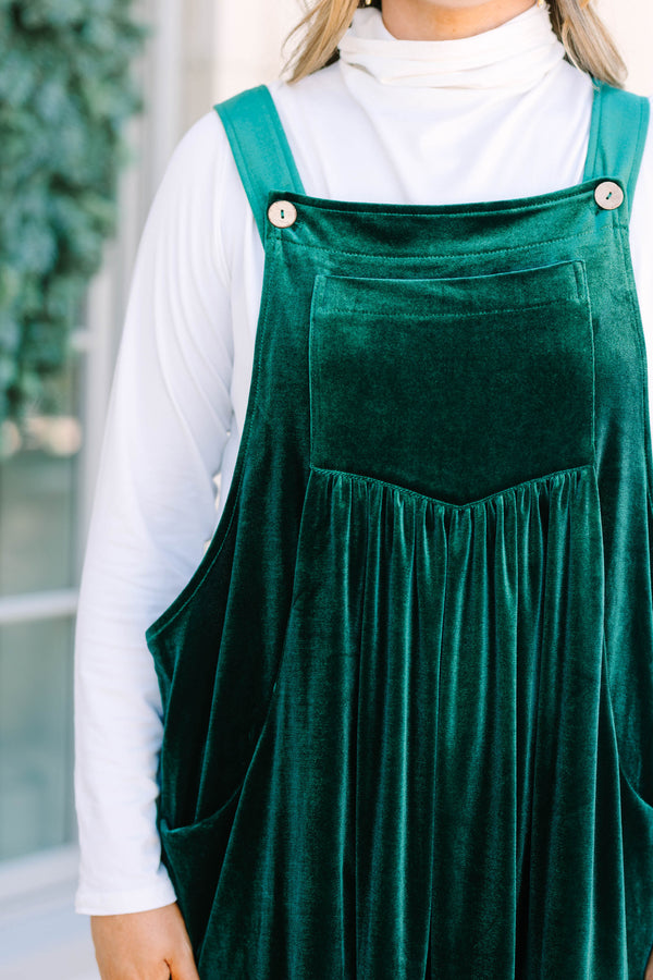Plus size hunter green velvet tiered overall dress with a flowy fit and pockets.