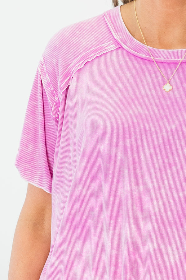 Chic Soul plus size clothing, bright mauve short sleeve top with acid wash detail with round neckline with outer stitch detail along neck and shoulders 