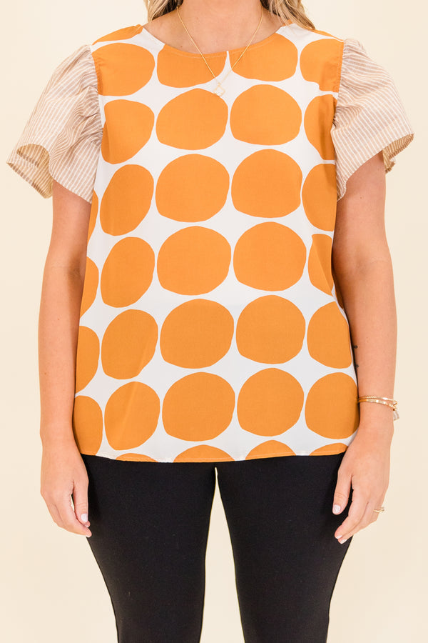 Chic Soul plus size clothing, taupe short sleeve top with orange and white polka dot print on front with taupe and white pinstripe pattern along sleeves and back