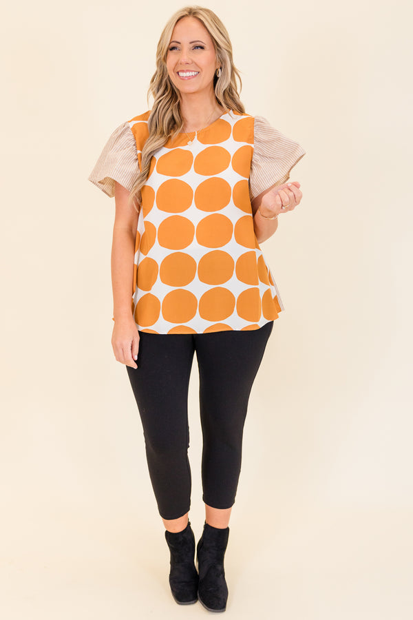Chic Soul plus size clothing, taupe short sleeve top with orange and white polka dot print on front with taupe and white pinstripe pattern along sleeves and back