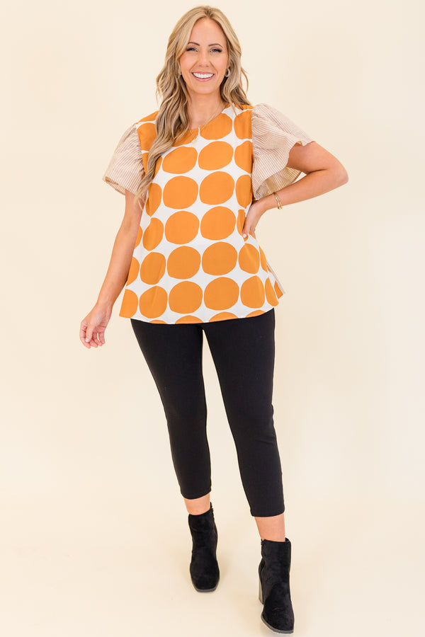 Chic Soul plus size clothing, taupe short sleeve top with orange and white polka dot print on front with taupe and white pinstripe pattern along sleeves and back