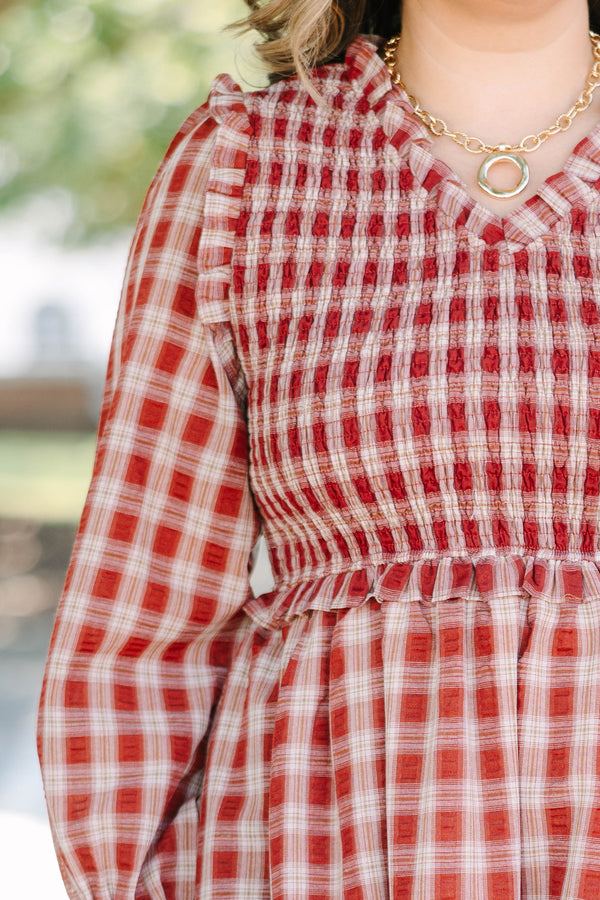 Plus Size red plaid midi dress with a smocked bodice, ruffled neckline, and long balloon sleeves.