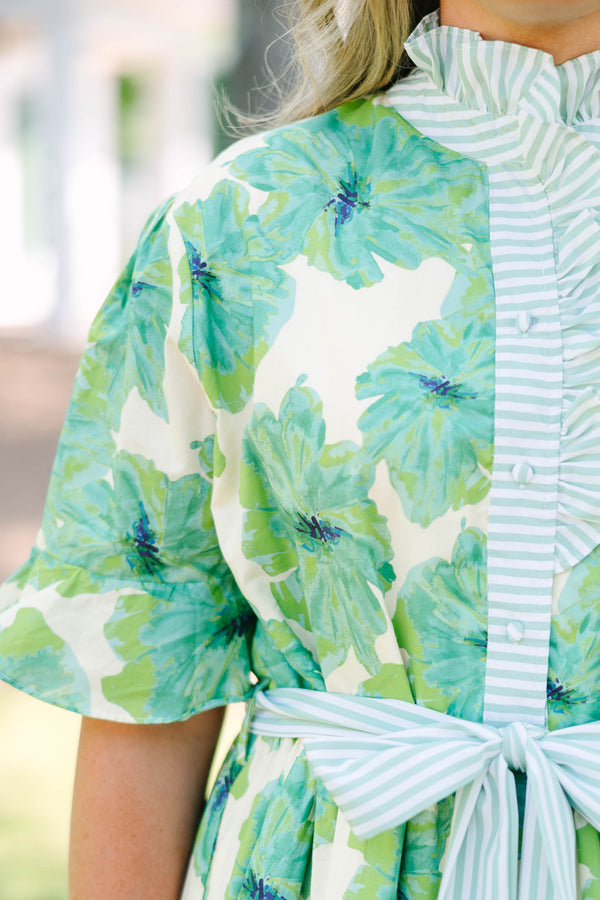 Plus Size green floral tiered midi dress with striped ruffle collar, sash belt, and flutter sleeves.