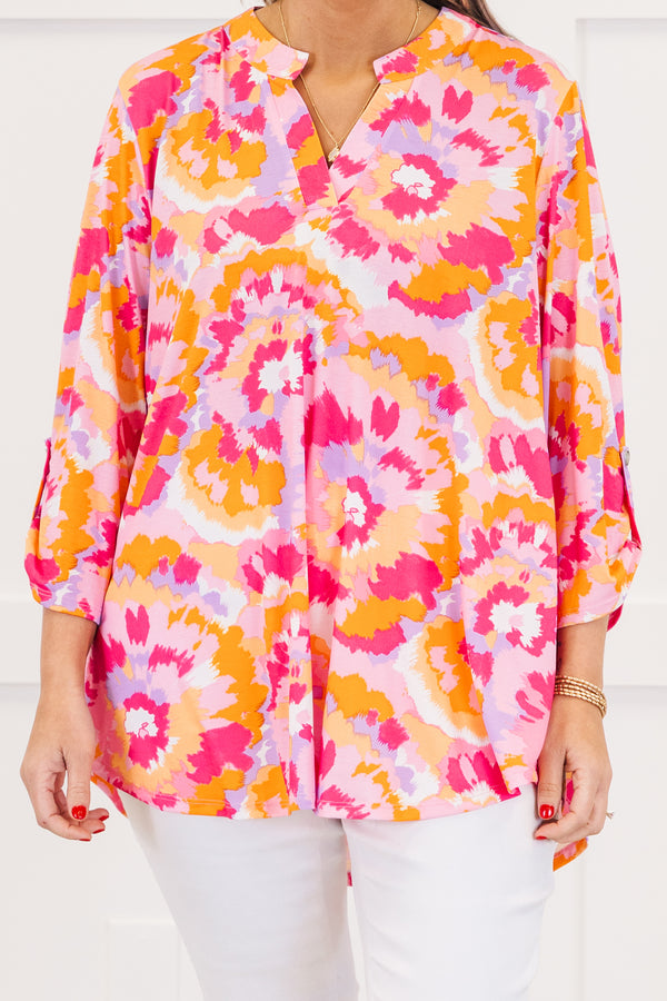 Chic Soul plus size clothing, pink three quarter length sleeve top with v neckline and button detail on sleeve with abstract orange/pink/purple print