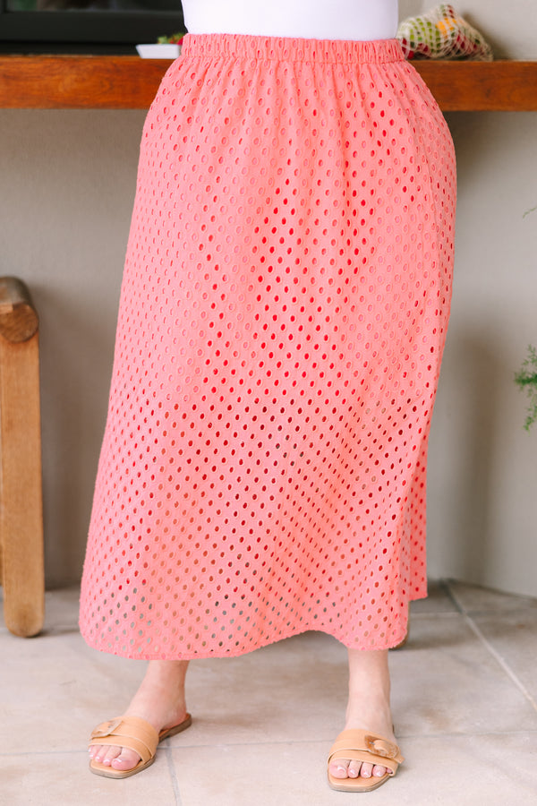 Plus Size coral eyelet midi skirt with an elastic waistband and a relaxed fit.