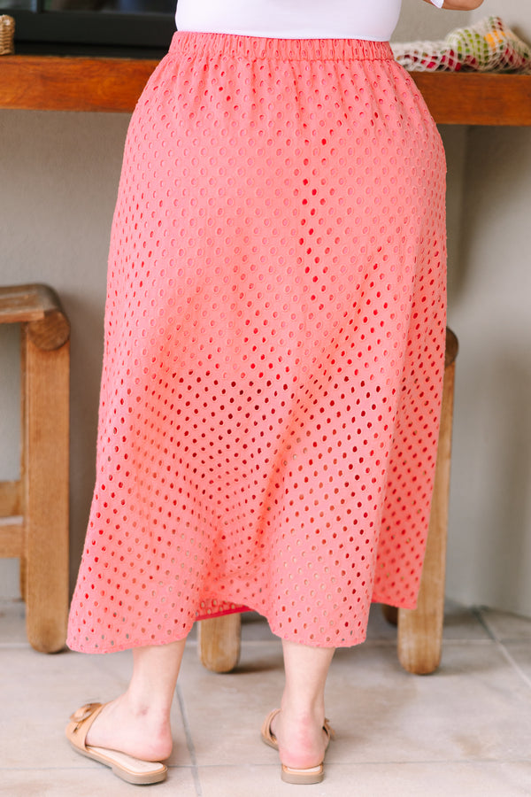 Plus Size coral eyelet midi skirt with an elastic waistband and a relaxed fit.
