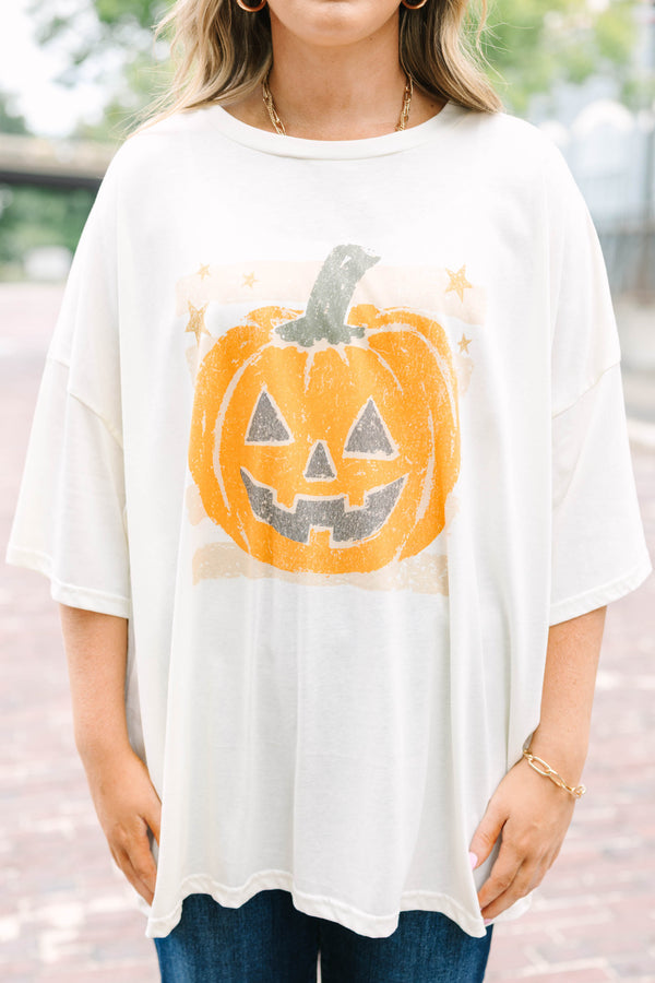 Ivory oversized boyfriend tee with a happy pumpkin graphic 