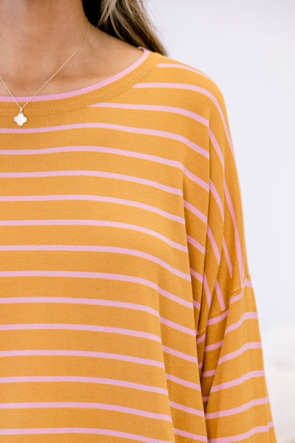 Chic Soul plus size clothing, brown long sleeve top with thin light pink horizontal stripes and a light pink ruffle hem