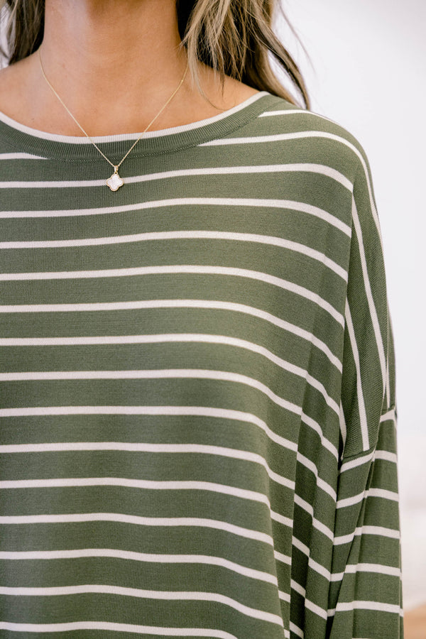 Chic Soul plus size clothing, olive green long sleeve top with white thin horizontal stripes and ruffle hem