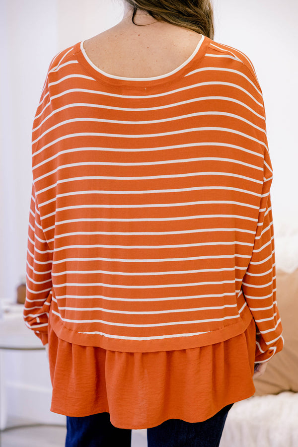 Chic Soul plus size clothing, rust red long sleeve top with white thin horizontal stripes and a ruffle hem
