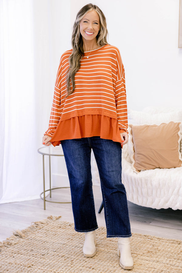 Chic Soul plus size clothing, rust red long sleeve top with white thin horizontal stripes and a ruffle hem