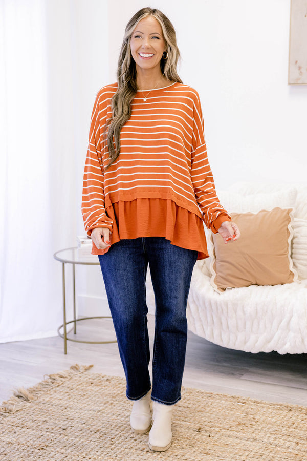 Chic Soul plus size clothing, rust red long sleeve top with white thin horizontal stripes and a ruffle hem