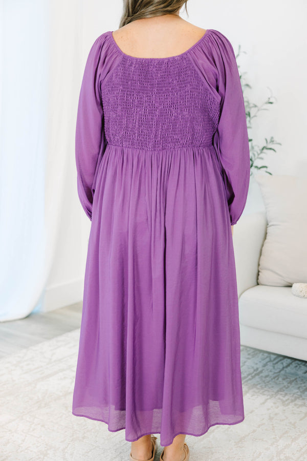 Plus Size plum midi dress with a bow-tie neckline, long balloon sleeves, and a flowy skirt.