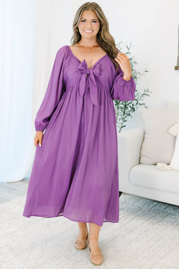 Plus Size plum midi dress with a bow-tie neckline, long balloon sleeves, and a flowy skirt.