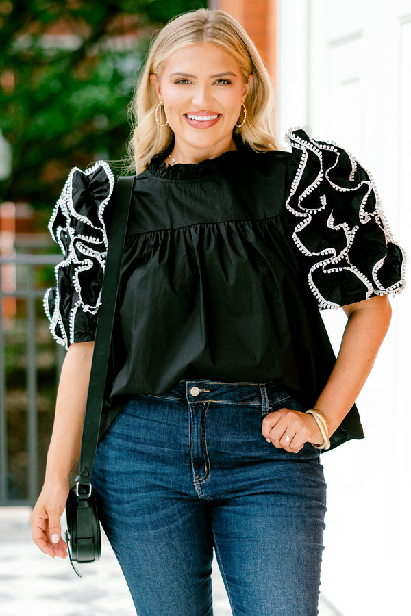Chic Soul plus size clothing, Black top with short sleeves that have ruffle details on each sleeve that are stitched with a white textured pattern