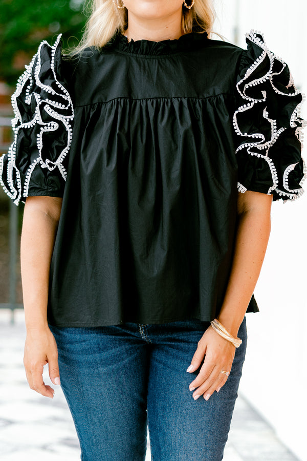 Chic Soul plus size clothing, Black top with short sleeves that have ruffle details on each sleeve that are stitched with a white textured pattern