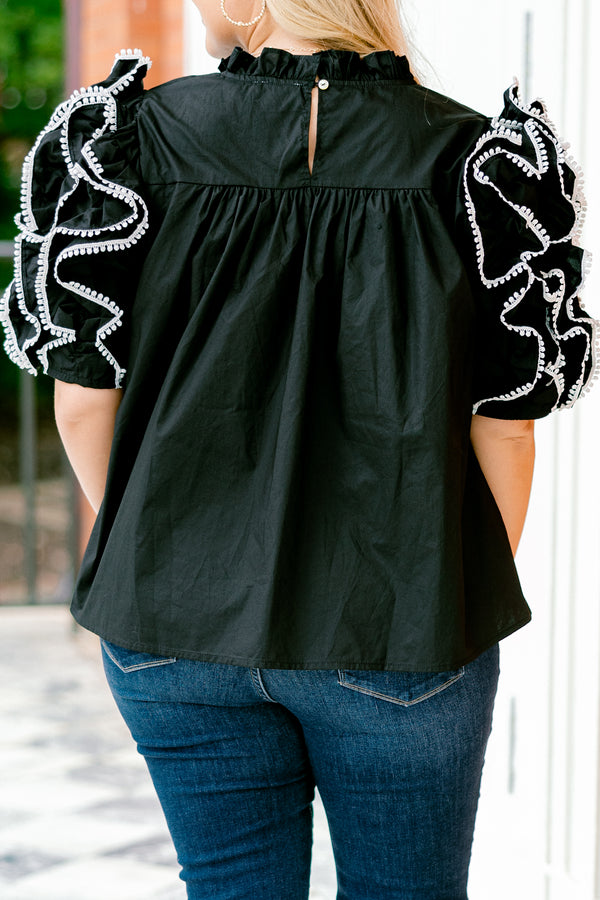 Chic Soul plus size clothing, Black top with short sleeves that have ruffle details on each sleeve that are stitched with a white textured pattern