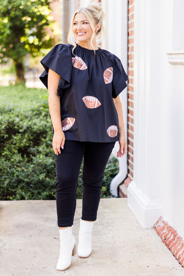  Chic Soul plus size clothing, short-flutter-sleeve black top with smocked neckline and brown sequin football patches scattered across top 