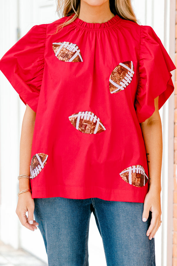 Chic Soul plus size clothing, red top with flutter sleeves and brown sparkly football patches throughout the shirt 