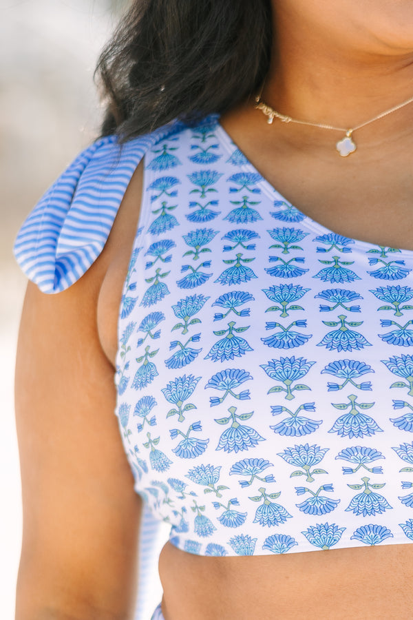 Chic Soul plus size clothing, blue floral one shoulder bikini top with a floral block pattern throughout and a blue striped bow that ties on top of the shoulder 